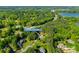 Aerial shot of the property located at 546 Little Cove Lane with surrounding trees and beautiful landscape at 546 Little Cove Ln, Lake Wylie, SC 29710