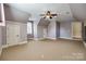 A spacious bedroom with carpet flooring and attic windows at 546 Little Cove Ln, Lake Wylie, SC 29710