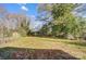 Large backyard with shed and mature trees at 105 Center St, Kings Mountain, NC 28086