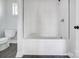 Bathroom with a shower/tub combo and white tile at 105 Center St, Kings Mountain, NC 28086