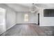 Bright dining room features hardwood floors and a chandelier at 105 Center St, Kings Mountain, NC 28086