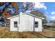 Rear view of a newly renovated house with a neat, white exterior at 105 Center St, Kings Mountain, NC 28086