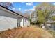 Rear view of the house showcasing a modern exterior and private backyard at 105 Center St, Kings Mountain, NC 28086