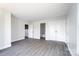 Main bedroom with hardwood floors and double doors to the bathroom at 105 Center St, Kings Mountain, NC 28086