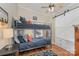 Well-lit bedroom featuring a metal bunk bed and built-in storage at 108 Elm St, New London, NC 28127