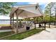 Lakeside gazebo with picnic tables and playground views at 108 Elm St, New London, NC 28127