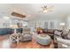 Open living room featuring a comfortable seating area and a view into the kitchen at 108 Elm St, New London, NC 28127