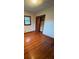 Hardwood floor bedroom with closet and window at 112 Adcock St, Belmont, NC 28012