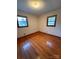 Hardwood floor bedroom with two windows at 112 Adcock St, Belmont, NC 28012