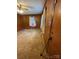 Simple bedroom with wood paneled walls and carpet at 112 Adcock St, Belmont, NC 28012