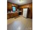 View of kitchen with wood cabinets and appliances at 112 Adcock St, Belmont, NC 28012