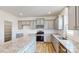 Modern kitchen with gray cabinets, granite countertops, and stainless steel appliances at 2078 Van Buren Rd, Sherrills Ford, NC 28673