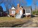 Front view of a brick ranch house with a yard at 602 W Graham St, Shelby, NC 28150