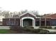 Exterior front of a brick YMCA building with white columns and well-maintained landscaping at 625 Charles St, Rockwell, NC 28138