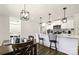 Bright kitchen featuring white cabinetry, stainless steel appliances, and modern pendant lighting at 625 Charles St, Rockwell, NC 28138