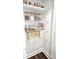 Organized pantry with adjustable white wire shelving and clear storage containers at 625 Charles St, Rockwell, NC 28138