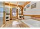 Bathroom with a large bathtub and double vanity at 917 Patrick Johnston Ln, Davidson, NC 28036