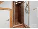 Beautiful bathroom boasts a tiled shower with glass door and neutral walls, creating a spa-like feel at 917 Patrick Johnston Ln, Davidson, NC 28036