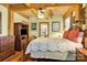 Bedroom with wooden ceiling beams and dresser at 917 Patrick Johnston Ln, Davidson, NC 28036