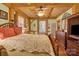 Bedroom with wooden ceiling beams and TV stand at 917 Patrick Johnston Ln, Davidson, NC 28036