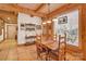 Bright breakfast nook with wood table and chairs, view to backyard at 917 Patrick Johnston Ln, Davidson, NC 28036