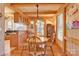 Charming dining room with wood table and chairs, hardwood floors at 917 Patrick Johnston Ln, Davidson, NC 28036