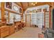 Bright home office features built-in shelves and wood desk at 917 Patrick Johnston Ln, Davidson, NC 28036