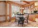 Dining area with wood table and access to the kitchen at 917 Patrick Johnston Ln, Davidson, NC 28036