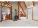 Inviting living room with a stone fireplace, wood beam ceiling, and a cozy atmosphere at 917 Patrick Johnston Ln, Davidson, NC 28036