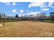 Large backyard with wooden fence and gazebo at 9315 Ames Hollow Rd, Charlotte, NC 28216