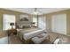 Bright bedroom with a queen-size bed and ample closet space at 9315 Ames Hollow Rd, Charlotte, NC 28216