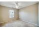 Bedroom with window, ceiling fan and closet at 9315 Ames Hollow Rd, Charlotte, NC 28216