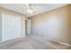 Bedroom with ceiling fan and closet at 9315 Ames Hollow Rd, Charlotte, NC 28216