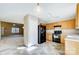 Bright kitchen with wood cabinets and black appliances at 9315 Ames Hollow Rd, Charlotte, NC 28216