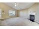 Simple living room with fireplace and carpet flooring at 9315 Ames Hollow Rd, Charlotte, NC 28216