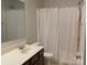 Clean bathroom with a shower/tub combo, toilet and vanity at 9514 Currier Rd, Charlotte, NC 28215