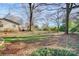 Large backyard with mature trees and shed at 9638 Pleasant View Ln, Mint Hill, NC 28227