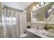 Bathroom with shower/tub, sink, and white tile at 9638 Pleasant View Ln, Mint Hill, NC 28227