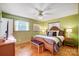 Spacious bedroom with wood floors and ceiling fan at 9638 Pleasant View Ln, Mint Hill, NC 28227