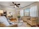 Living room with hardwood floors, neutral decor and plenty of light at 9638 Pleasant View Ln, Mint Hill, NC 28227