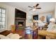 Cozy living room features a fireplace, hardwood floors, and ample natural light at 9638 Pleasant View Ln, Mint Hill, NC 28227