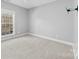 Simple bedroom with carpet and window at 1298 Hines Rd, Clover, SC 29710