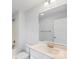 Clean bathroom with a single sink vanity and bathtub at 17 N Arlington St, Salisbury, NC 28144