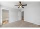 Spacious bedroom with carpeting and access to a full bathroom at 17 N Arlington St, Salisbury, NC 28144