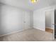 Cozy bedroom with neutral wall colors and carpet flooring at 17 N Arlington St, Salisbury, NC 28144