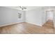 Bright bedroom with light wood floors and ceiling fan at 17 N Arlington St, Salisbury, NC 28144