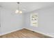 Simple dining area with hardwood floors and a window at 17 N Arlington St, Salisbury, NC 28144