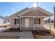 Newly built tan house with a front porch at 17 N Arlington St, Salisbury, NC 28144