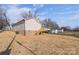 Tan house with wooden deck and steps at 17 N Arlington St, Salisbury, NC 28144
