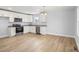 Modern kitchen features stainless steel appliances and light-colored cabinetry at 17 N Arlington St, Salisbury, NC 28144
